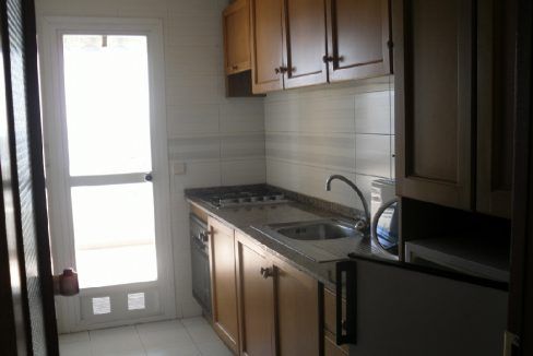 Kitchen with door onto 2nd balcony