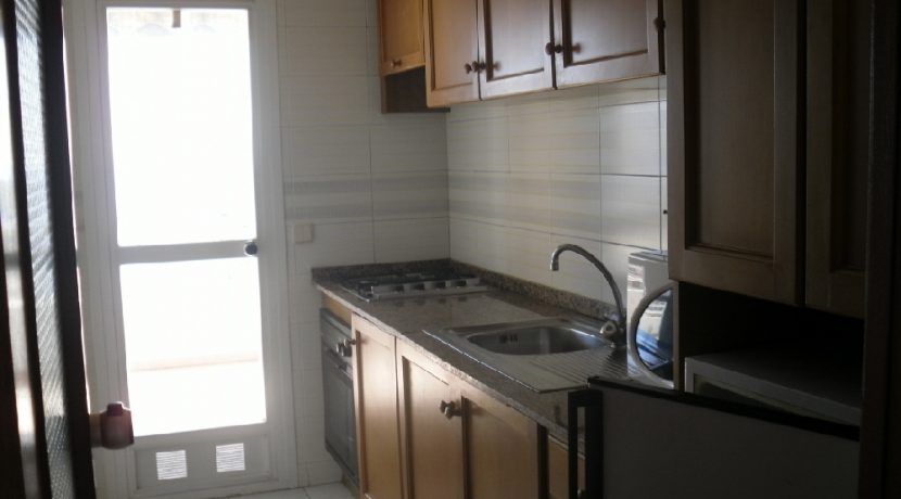 Kitchen with door onto 2nd balcony